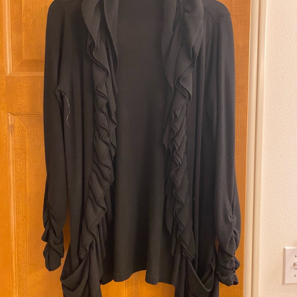 Black ruffled cardigan, Women’s Medium. From Maurice’s clothing store.